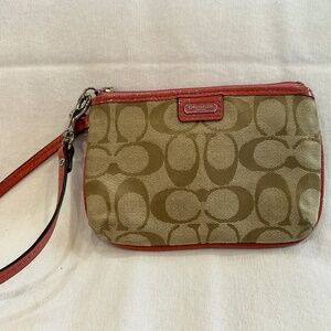 Coach signature small Wristlet - tan w/pink trim and strap
